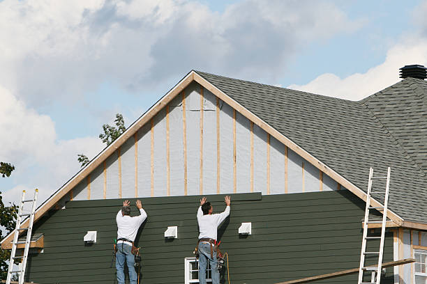 Professional Emergency Siding Repair technician working in Tracys Landing, MD